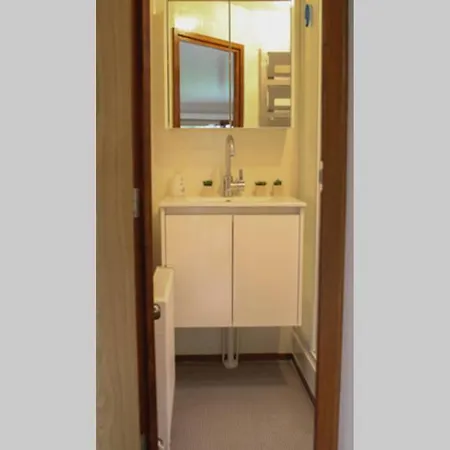 Gezellig Chalet Met Prive Jacuzzi בקתה פוטן